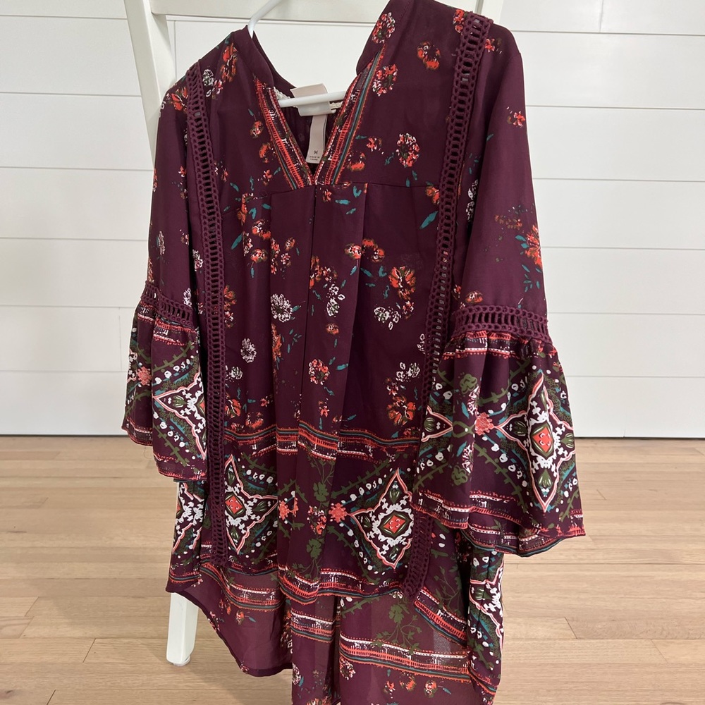 Knox Rose size medium top. Maroon with other complementary colors.